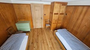 Voodi või voodid majutusasutuse Chalet Bärgsunne toas