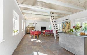 A television and/or entertainment centre at 1 Bedroom Cozy Apartment In Svendborg