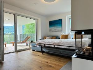 Posteľ alebo postele v izbe v ubytovaní Chalet Lungau-View - Ferienhaus mit Aussicht