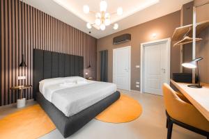 Ένα ή περισσότερα κρεβάτια σε δωμάτιο στο macan suite rooms