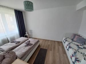 Postel nebo postele na pokoji v ubytování Zlatá Olešnice, pomezí Jizerek a Krkonoš