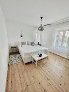 Postel nebo postele na pokoji v ubytování Villa 1880