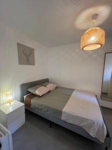 Posteľ alebo postele v izbe v ubytovaní Appartement 4 personnes, Piscine, Parking à Palavas les flots
