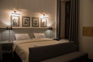 Postel nebo postele na pokoji v ubytování Hotel Retro B.A. Zientarski