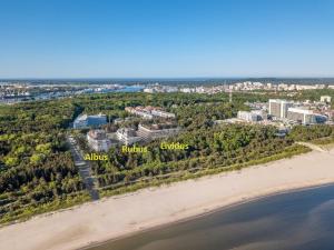 an aerial view of the beach and buildings at Morski Apartament 50 m od plaży ApartPark in Świnoujście