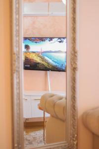 TV a/nebo společenská místnost v ubytování Apartman M&M