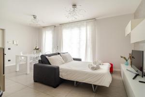 TV a/nebo společenská místnost v ubytování Dalmine Luxury Suite