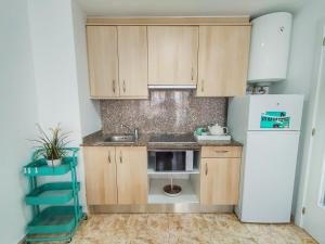 Kuchyň nebo kuchyňský kout v ubytování CBN Apartments