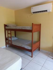 Ένα ή περισσότερα κρεβάτια σε δωμάτιο στο La Casa de Pedro Hostel