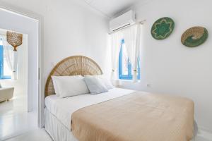 Postel nebo postele na pokoji v ubytování Maison Mariel Skopelos