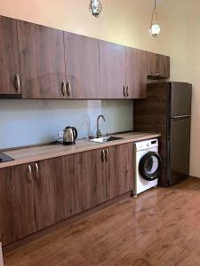 Kuchyň nebo kuchyňský kout v ubytování Orbeliani Guesthouse + 9 fotografií