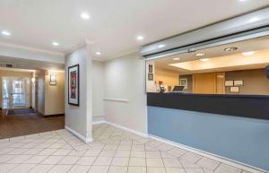 a lobby of a hotel with a reception desk at Extended Stay America Select Suites - Chicago - Westmont - Oak Brook in Westmont