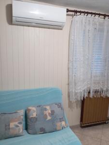 Postel nebo postele na pokoji v ubytování Apartman Kiwi