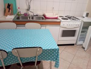 Kuchyň nebo kuchyňský kout v ubytování Apartman Kiwi