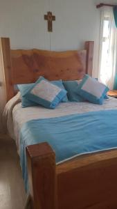 A bed or beds in a room at Casa campo, familiar