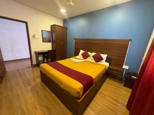 Postel nebo postele na pokoji v ubytování Hotel New Cresent park