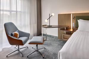 Postel nebo postele na pokoji v ubytování Courtyard by Marriott Magdeburg