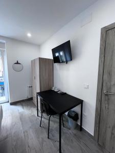 TV a/nebo společenská místnost v ubytování Habitación turística en Irún