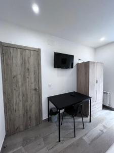 TV a/nebo společenská místnost v ubytování Habitación turística en Irún