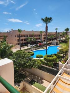 Bazén v ubytovaní ÁTICO DUPLEX ESPECTACULAR MARMOLADO con PISCINA PRIVADA! alebo v jeho blízkosti