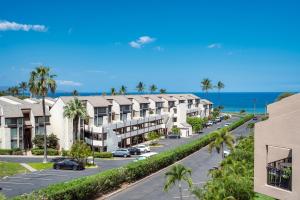 an aerial view of a resort with a parking lot at Kamaole Sands in Wailea