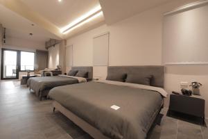 Voodi või voodid majutusasutuse 沒有名字Unnamed B&B toas