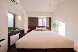 Kuchyň nebo kuchyňský kout v ubytování Nipponbashi Crystal Hotel