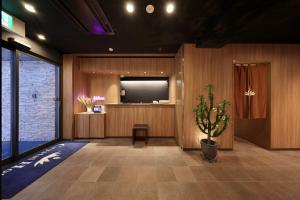 TV a/nebo společenská místnost v ubytování Nipponbashi Crystal Hotel