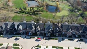 an aerial view of a large house with houses at Serene High-celling Retreat in Oakville