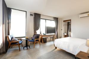 Postel nebo postele na pokoji v ubytování VIYA lodge