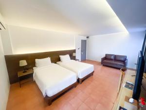Postel nebo postele na pokoji v ubytování VIYA lodge