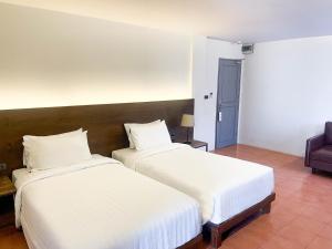 Postel nebo postele na pokoji v ubytování VIYA lodge