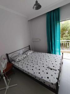 Φωτογραφία από το άλμπουμ του Beachfront apartment 10m from the beach στην Παραλία Διονυσίου