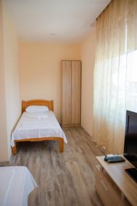 A bed or beds in a room at Summer Blue - Holiday House