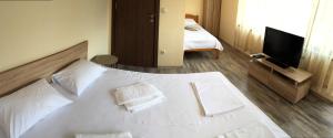 A bed or beds in a room at Summer Blue - Holiday House