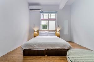 Postel nebo postele na pokoji v ubytování 5-1 Homestay
