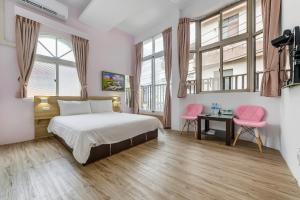 Postel nebo postele na pokoji v ubytování 5-1 Homestay