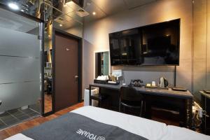 Kuchyň nebo kuchyňský kout v ubytování You&Me Hotel + 37 fotografií