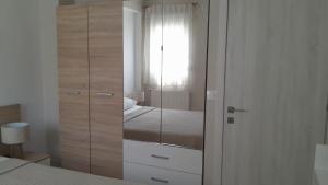 Koupelna v ubytování Nymfes House. + 37 fotografií