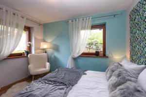 Posteľ alebo postele v izbe v ubytovaní APARTAMENT "NA MOCARNI"