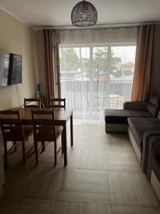 Posedenie v ubytovaní Apartament na Wydmach