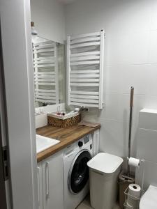 Kúpeľňa v ubytovaní Apartament na Wydmach
