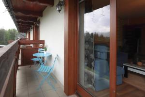 Balkón alebo terasa v ubytovaní APARTAMENT "NA MOCARNI"