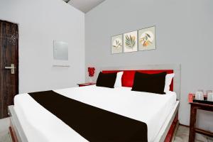 Ένα ή περισσότερα κρεβάτια σε δωμάτιο στο Hotel O The King Heaven