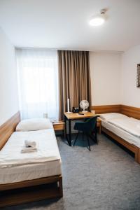 Katil atau katil-katil dalam bilik di Hotel Forea