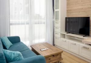 TV a/nebo společenská místnost v ubytování Homey 1-BD Apartment in Varna, next to Grand Mall Varna by Flat Mаnаger