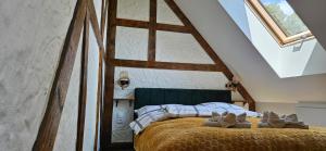 Łóżko lub łóżka w pokoju w obiekcie Apartamenty Komarno 46 Jacuzzi&Sauna