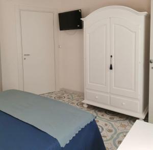 Postel nebo postele na pokoji v ubytování B&B casa Petrarca