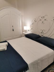 Postel nebo postele na pokoji v ubytování B&B casa Petrarca