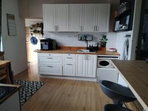 Kuchyň nebo kuchyňský kout v ubytování Nice HOME